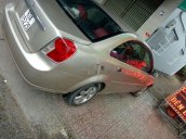 Cần bán xe Daewoo Lacetti đời 2004, màu vàng cát