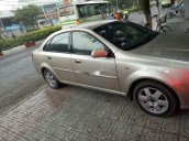 Cần bán xe Daewoo Lacetti đời 2004, màu vàng cát