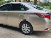 Cần bán Toyota Vios 2015, màu vàng còn mới