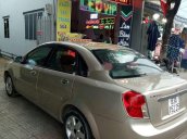 Cần bán xe Daewoo Lacetti đời 2004, màu vàng cát