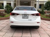 Bán ô tô Mazda 3 đăng ký lần đầu 2015, màu trắng, xe gia đình, giá tốt 495 triệu đồng