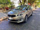 Cần bán xe Kia Rondo GAT năm sản xuất 2015, màu vàng cát