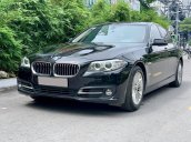 BMW 520i sản xuất 2014 đen/kem biển HN, full option: Cửa hit, đá cốp, màn hình to