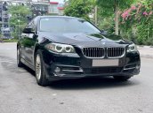 BMW 520i sản xuất 2014 đen/kem biển HN, full option: Cửa hit, đá cốp, màn hình to