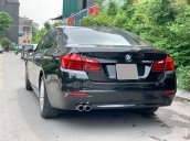 BMW 520i sản xuất 2014 đen/kem biển HN, full option: Cửa hit, đá cốp, màn hình to