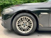 BMW 520i sản xuất 2014 đen/kem biển HN, full option: Cửa hit, đá cốp, màn hình to
