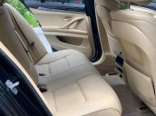 BMW 520i sản xuất 2014 đen/kem biển HN, full option: Cửa hit, đá cốp, màn hình to