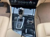 BMW 520i sản xuất 2014 đen/kem biển HN, full option: Cửa hit, đá cốp, màn hình to