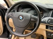 BMW 520i sản xuất 2014 đen/kem biển HN, full option: Cửa hit, đá cốp, màn hình to