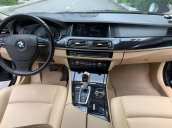 BMW 520i sản xuất 2014 đen/kem biển HN, full option: Cửa hit, đá cốp, màn hình to