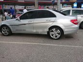 Bán Mercedes C250 đời 2014, màu bạc còn mới