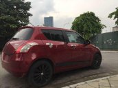 Gia đình bán Suzuki Swift sản xuất 2014, màu đỏ