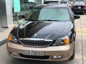 Cần bán gấp Daewoo Magnus 2004, màu đen  