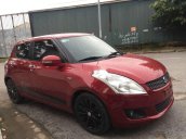 Gia đình bán Suzuki Swift sản xuất 2014, màu đỏ