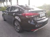 Bán xe Kia Cerato sản xuất 2016, màu đen