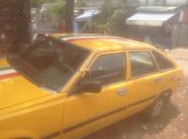 Xe Toyota Camry 1983, màu vàng, nhập khẩu