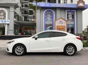 Cần bán Mazda 3 AT sản xuất 2015, màu trắng còn mới 