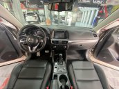 Cần bán xe Mazda CX 5 SX 2016 màu vàng cát, đi 40 000km
