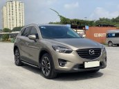 Cần bán xe Mazda CX 5 SX 2016 màu vàng cát, đi 40 000km
