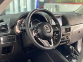 Cần bán xe Mazda CX 5 SX 2016 màu vàng cát, đi 40 000km
