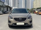 Cần bán xe Mazda CX 5 SX 2016 màu vàng cát, đi 40 000km
