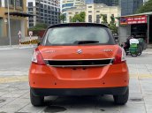 Cần bán xe Suzuki Swift SX 2015, màu cam nội thất đen, đi 52 000km