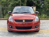 Cần bán xe Suzuki Swift SX 2016, màu đỏ cam, nội thất đen