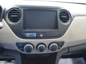 Bán xe Hyundai Grand i10 1.2MT Base, dáng sedan, màu trắng