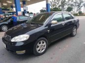 Bán xe Toyota Corolla Altis sản xuất năm 2004, màu đen còn mới, giá chỉ 238 triệu