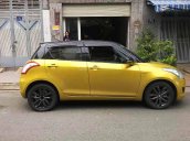 Cần bán lại xe Suzuki Swift sản xuất 2017, màu vàng còn mới, 420 triệu