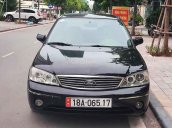 Cần bán xe Ford Laser Ghia 1.8 MT sản xuất năm 2003, màu đen, giá cạnh tranh