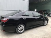 Bán xe Toyota Camry năm 2015, màu đen, giá thấp động cơ ổn định 