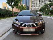 Cần bán xe Toyota Corolla Altis đời 2015, màu nâu