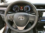 Cần bán xe Toyota Corolla Altis đời 2015, màu nâu