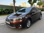 Cần bán xe Toyota Corolla Altis đời 2015, màu nâu