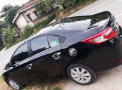 Cần bán xe Toyota Vios năm 2015, màu đen còn mới