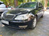 Cần bán Toyota Camry sản xuất 2006, màu đen còn mới