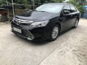 Bán xe Toyota Camry năm 2015, màu đen, giá thấp động cơ ổn định 