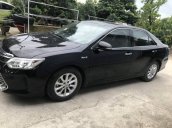 Bán xe Toyota Camry năm 2015, màu đen, giá thấp động cơ ổn định 