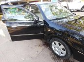 Bán ô tô Ford Laser sản xuất năm 2003, màu đen, bản đủ