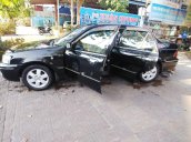 Bán ô tô Ford Laser sản xuất năm 2003, màu đen, bản đủ