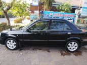 Bán ô tô Ford Laser sản xuất năm 2003, màu đen, bản đủ