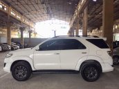 Cần bán xe Toyota Fortuner TRDSportivo 2014, màu trắng gia đình Tp. HCM - xe cũ chính hãng Toyota Sure