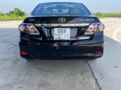 Cần bán lại xe Toyota Corolla Altis năm sản xuất 2013, màu đen, số sàn