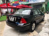 Bán ô tô Ford Laser đời 2004, màu đen