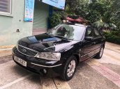 Bán ô tô Ford Laser đời 2004, màu đen