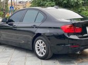 Cần bán lại xe BMW 320i sản xuất năm 2013, màu đen, nhập khẩu, giá 680tr