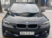 Cần bán lại xe BMW 320i sản xuất năm 2013, màu đen, nhập khẩu, giá 680tr