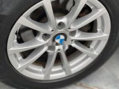 Cần bán lại xe BMW 320i sản xuất năm 2013, màu đen, nhập khẩu, giá 680tr