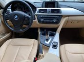 Cần bán lại xe BMW 320i sản xuất năm 2013, màu đen, nhập khẩu, giá 680tr